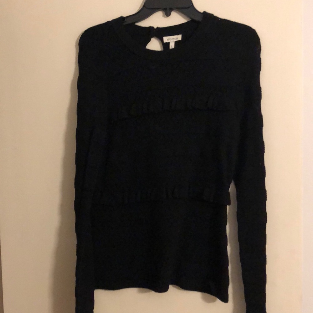 Black Ella Moss sweater size Large. Long sleeve with ruffle at end of sleeve.